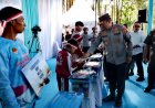 Polda Jatim Beri Bantuan Alat Pertanian Kepada Kelompok Tani dan Baksos Pemeriksaan Kesehatan Gratis